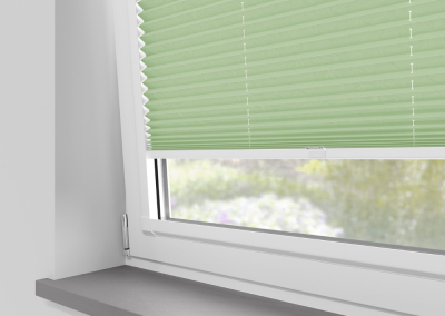 Mint green window blinds with sill