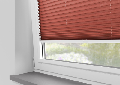 Red window blinds with gray sill