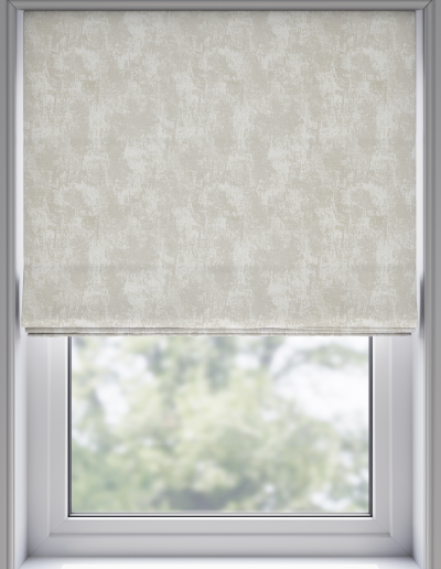 Light-colored roller blind covering window