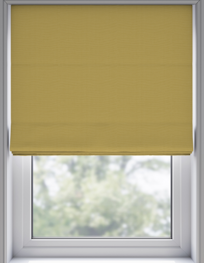 Yellow roller blind covering window