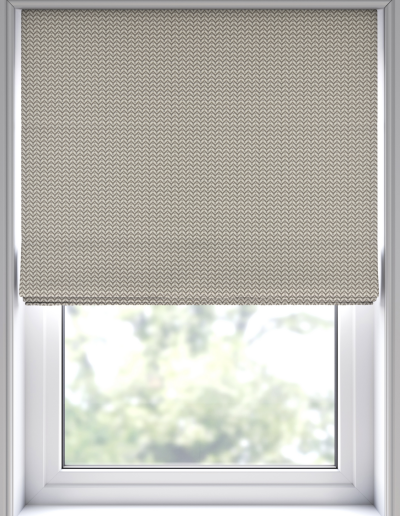 Patterned roller blind covering window